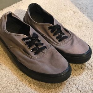 Purple/gray vans with black laces and black bottom
